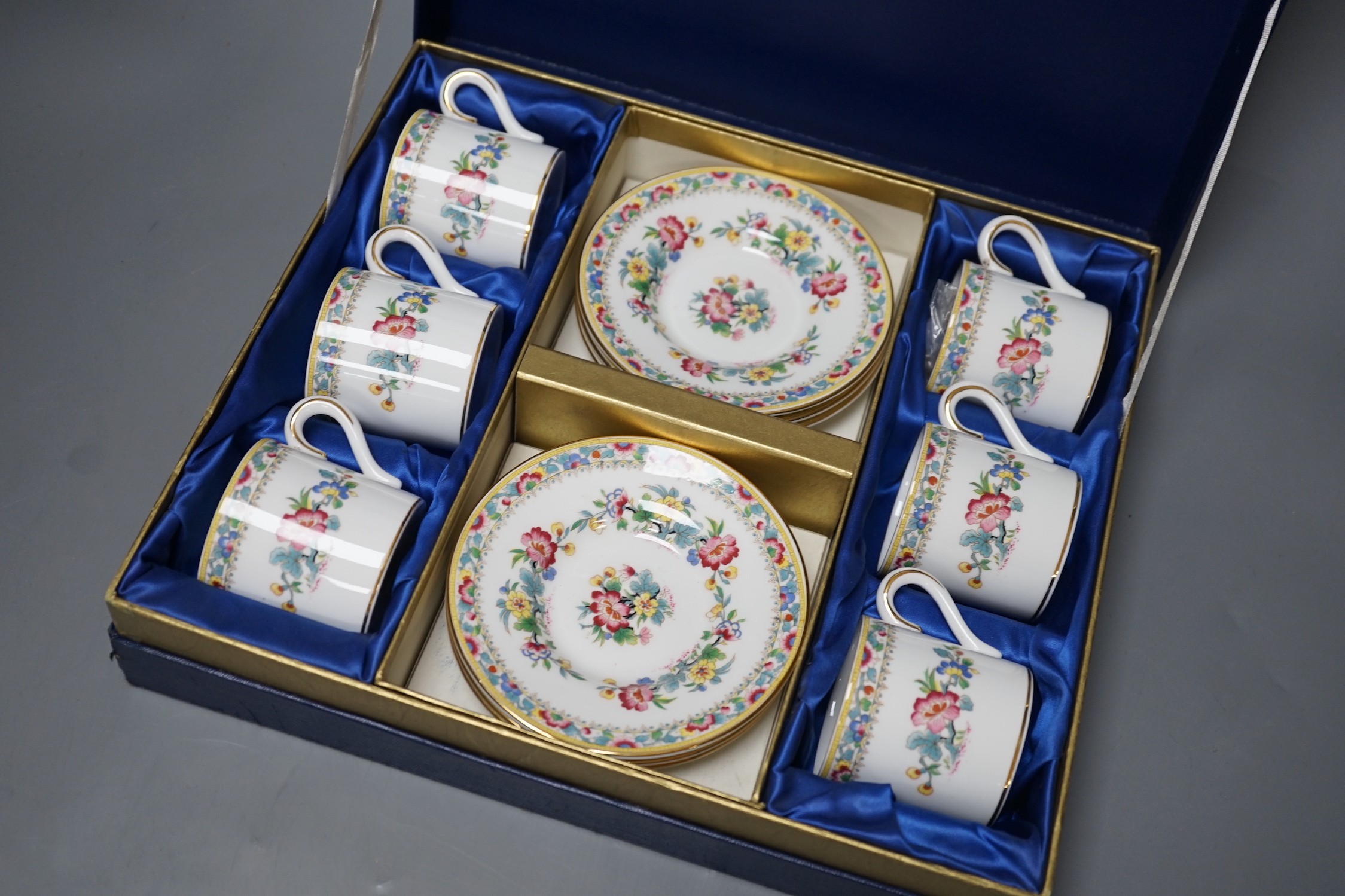 A Coalport floral coffee set, boxed